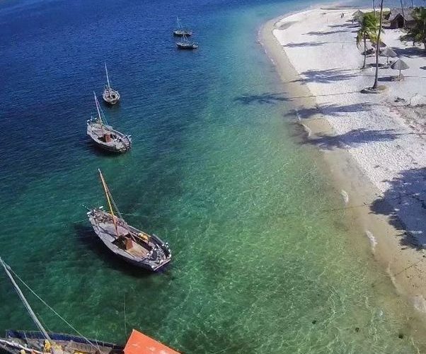 Clear waters, vibrant coral reefs, and serene beaches on Mafia Island.