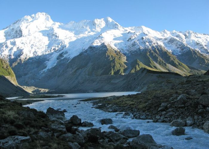 Majestic Rwenzori Mountains with snow-capped peaks and lush valleys