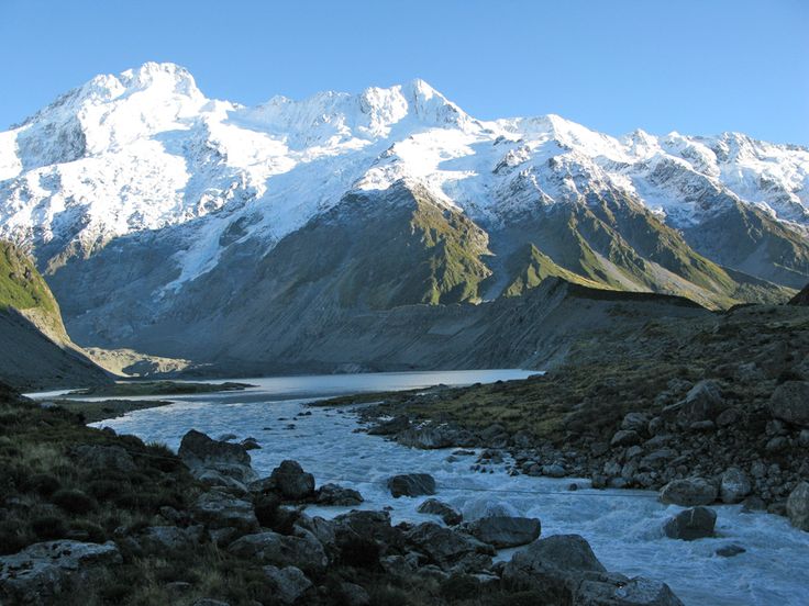 Majestic Rwenzori Mountains with snow-capped peaks and lush valleys